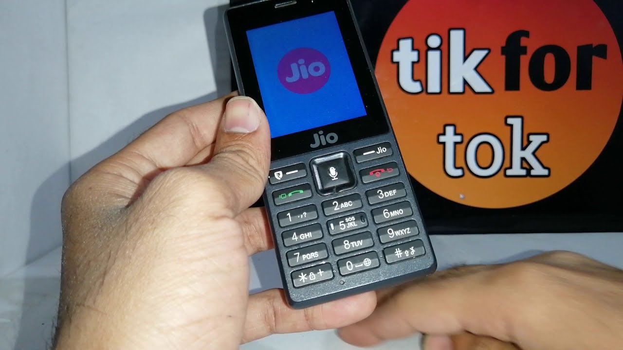how to insert sim card in jio phone f220b