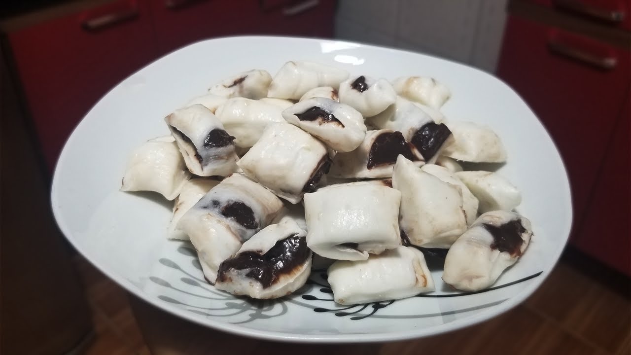 Bala de coco Recheada com Brigadeiro e Castanha do Pará