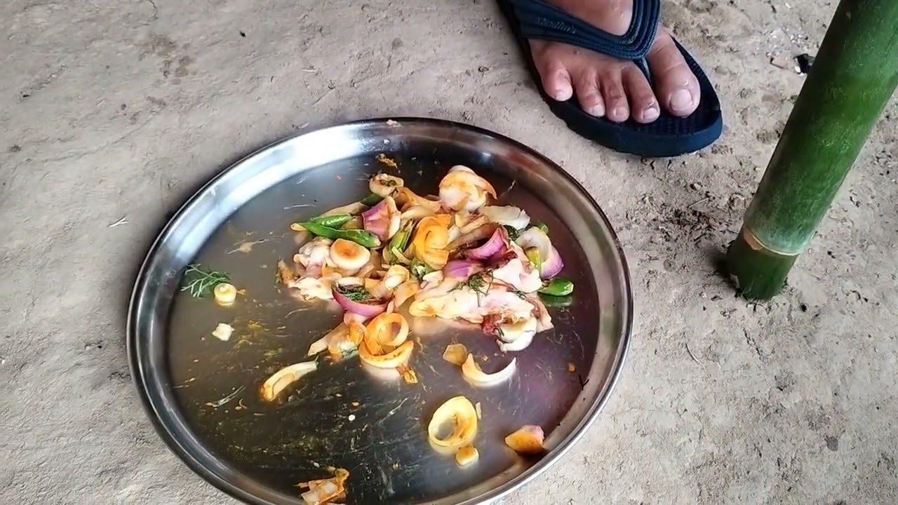 Cooking in bamboo tube 