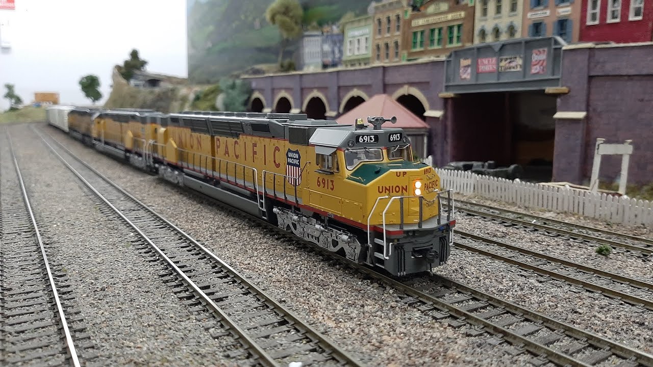 Triple Headed Athearn Genesis HO Union Pacific DDA40X on large Club layout.