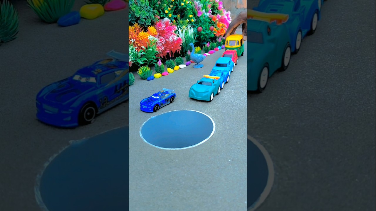 Pushing tractor and car in pit 