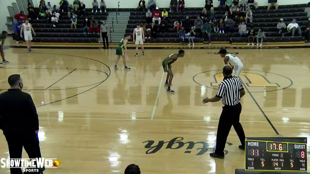 University High (white) vs Walker High (green) - Varsity Basketball