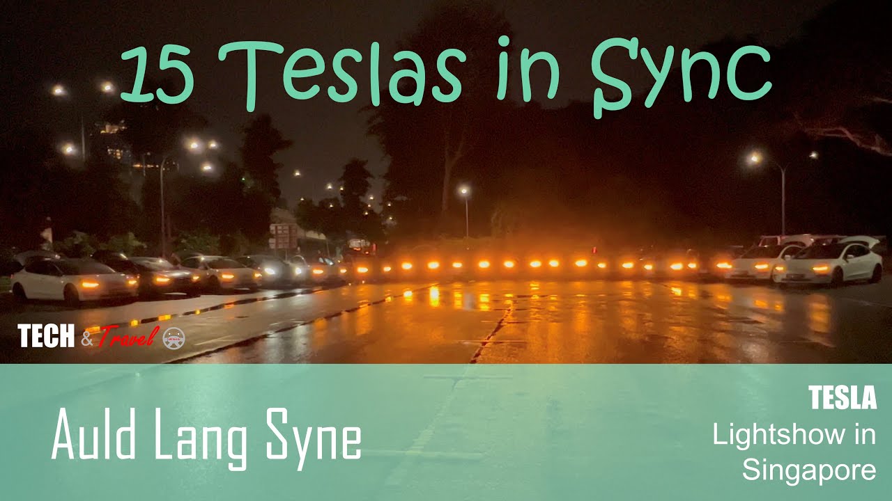 Synchronized Lightshow by 15 Tesla cars in Singapore (Auld Lang Syne)