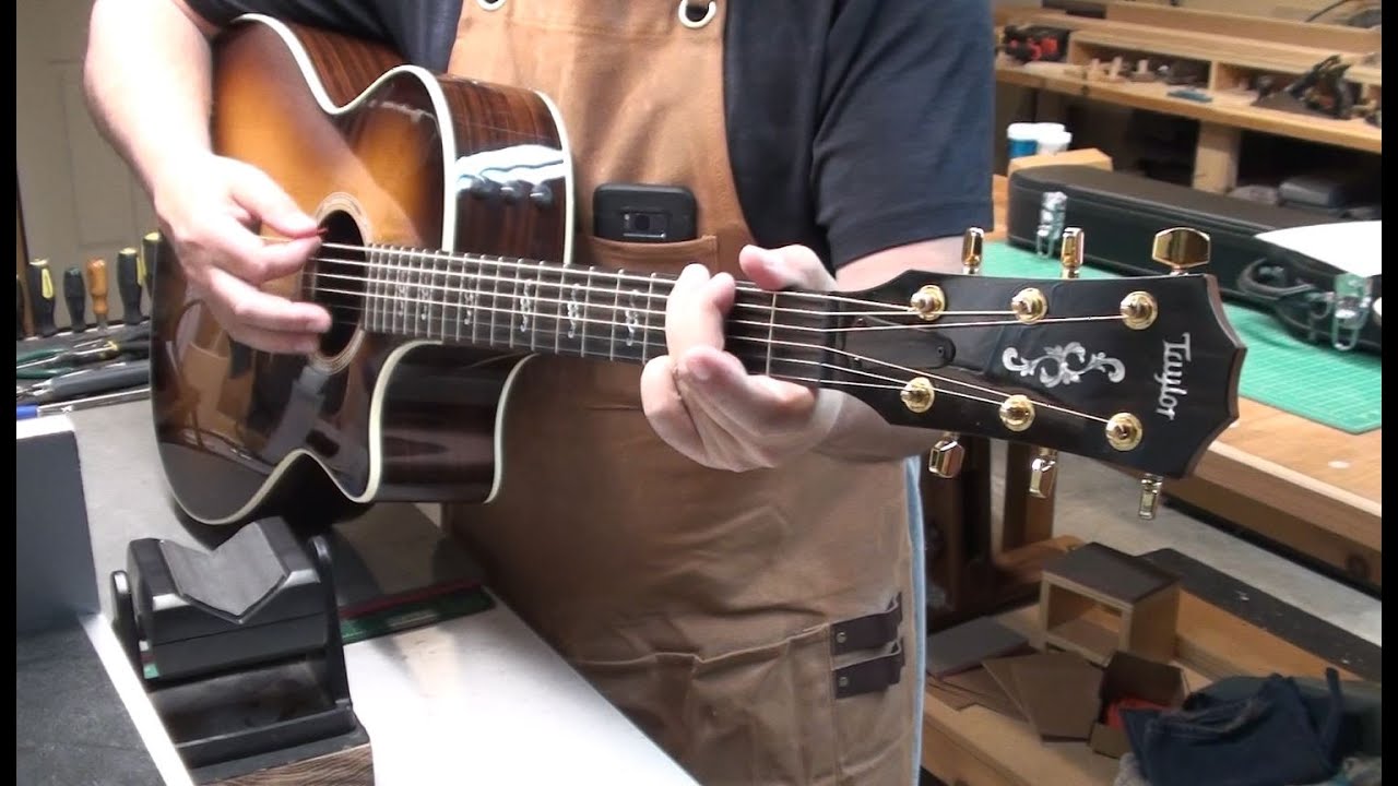 This Taylor Acoustic Guitar factory setup is better than most electric guitars!  Model 414CE Custom.