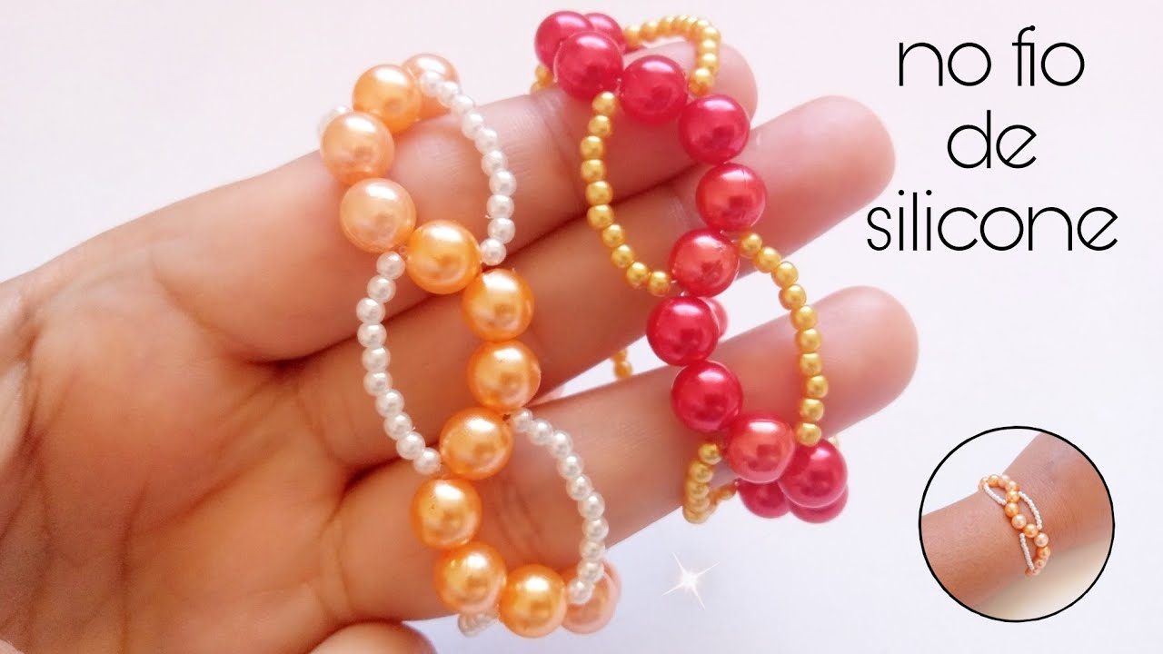 Pulseira de pérolas no fio de silicone/super fácil.