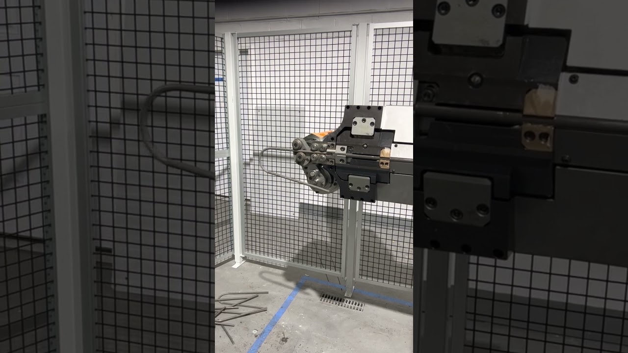 Numalliance Robomac 3D CNC Wire Forming Machine Producing Large Tent Stakes