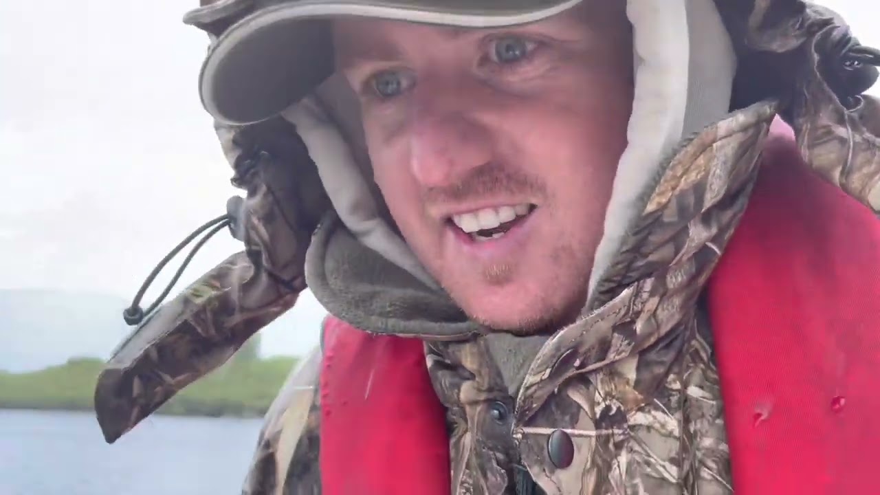 Fly fishing loch Katrine from the boat