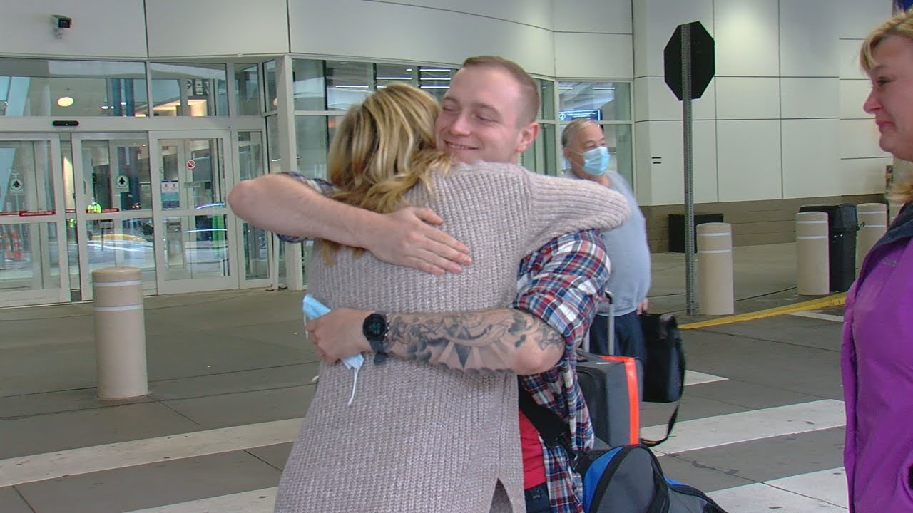 Thanksgiving travelers arriving at CVG report light crowds, happy to see loved ones