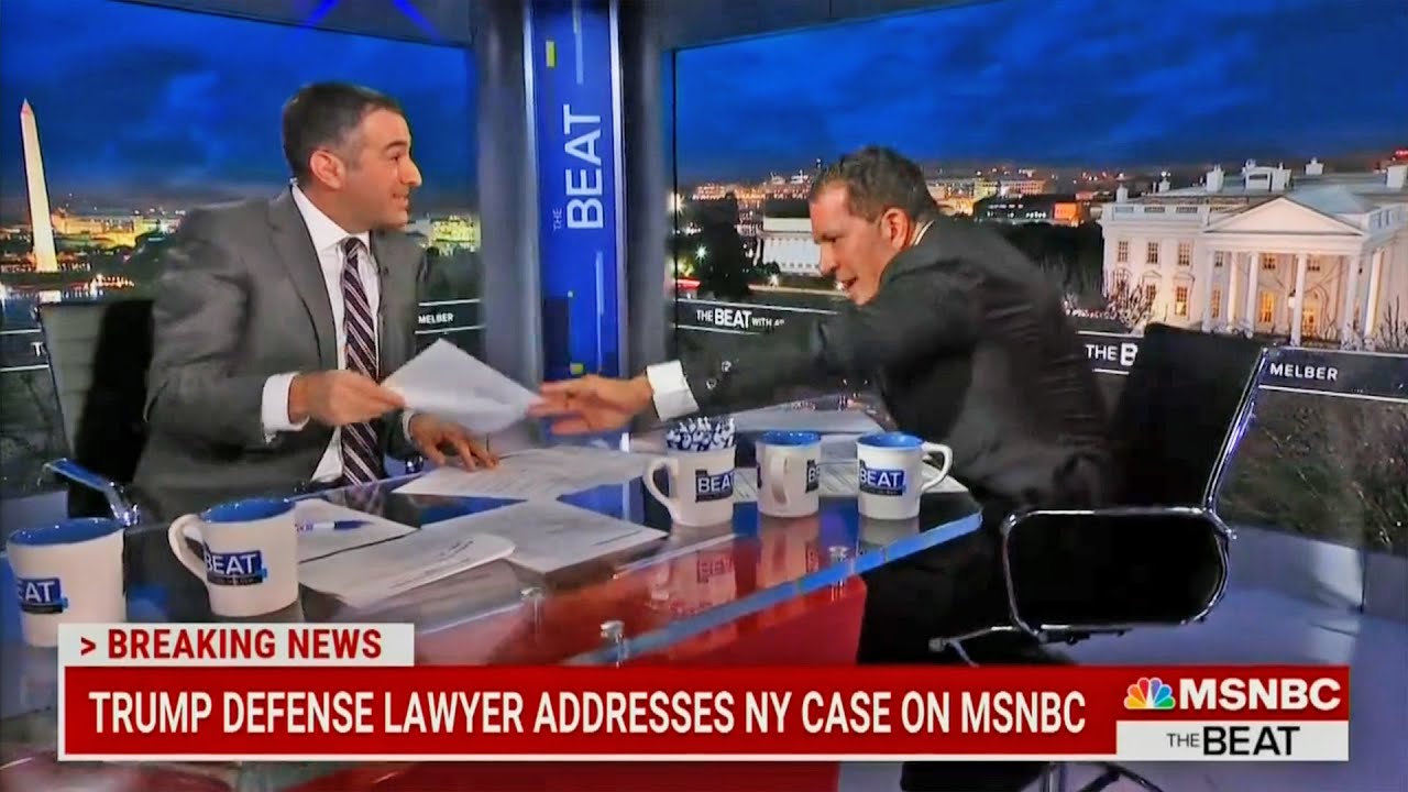 Trump's lawyer lunges at host in live TV meltdown