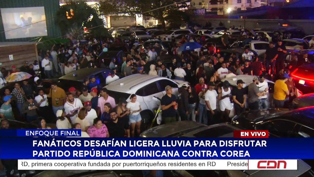 Fanáticos desafían ligera lluvia para disfrutar partido República Dominicana contra Corea