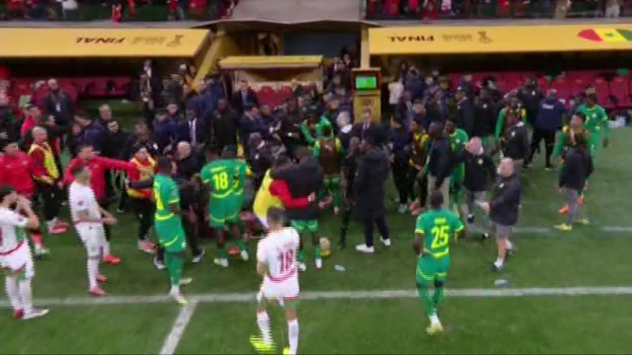 Afcon chaos as Senegal manager orders players off pitch after hosts Morocco given 98th-minute penalt