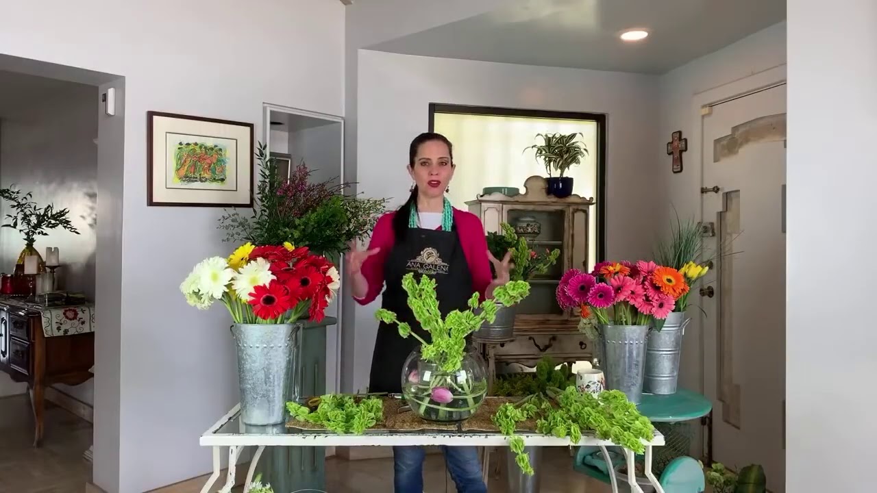 Arreglo floral con gerberas en pecera