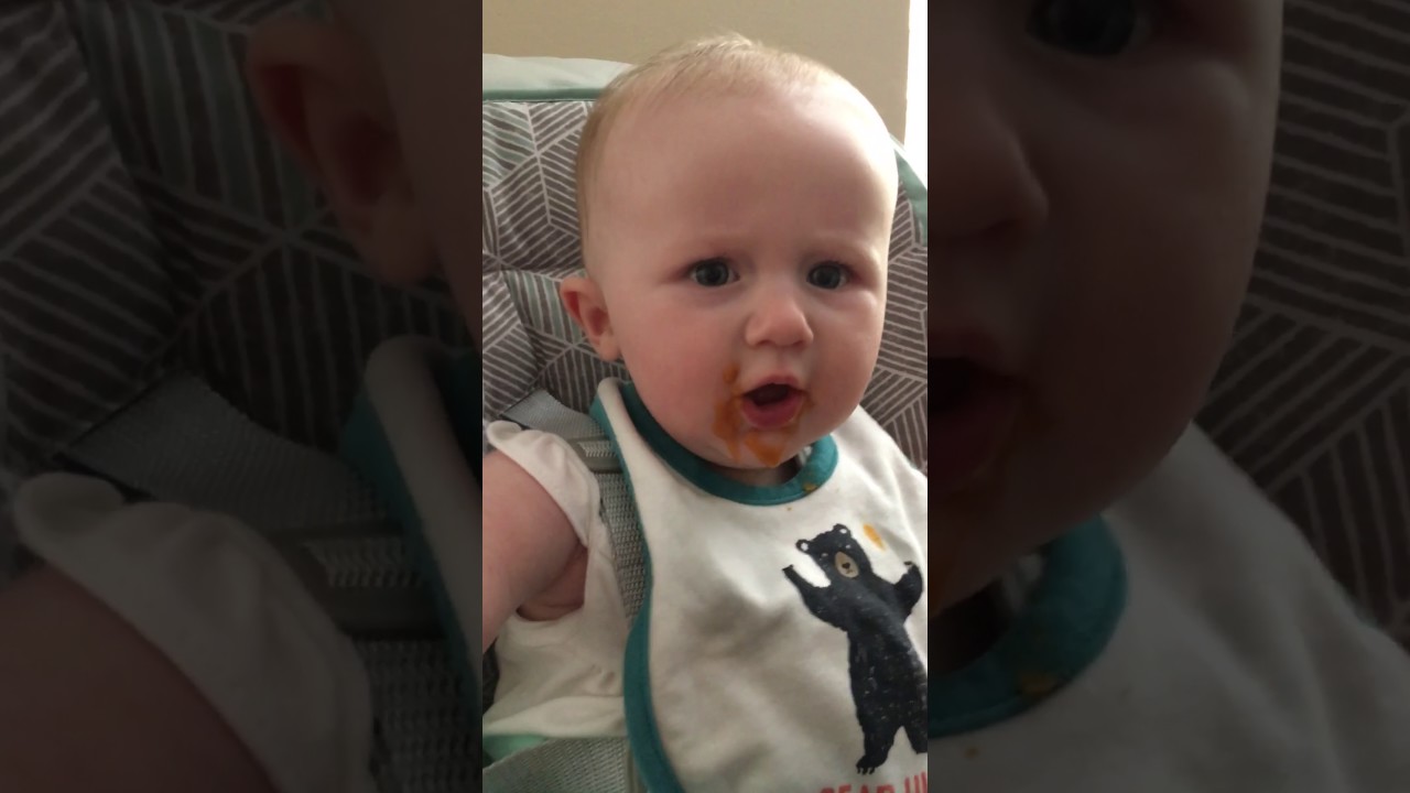 Chloe eating solid food - first time