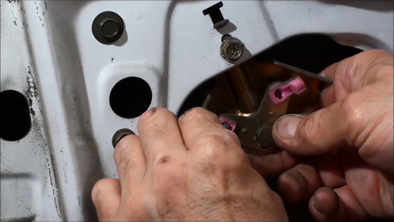 Nissan Frontier how to remove the Drivers door lock actuator assembly 3.3L Crew Cab