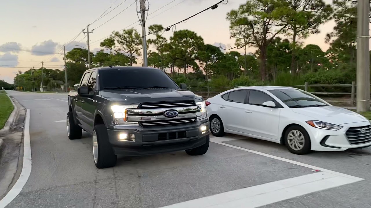 Leveled f150 on 22x12s and 305s