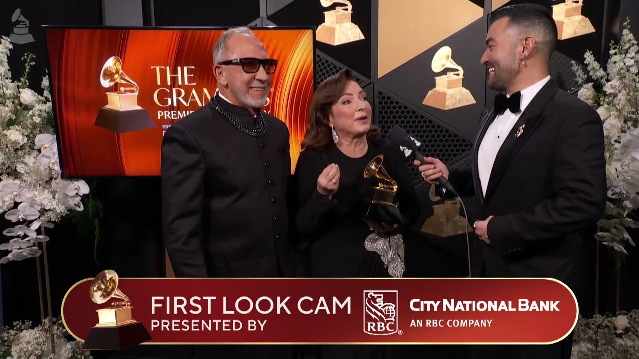 GLORIA ESTEFAN & EMILIO ESTEFAN Check In At The City National Bank 