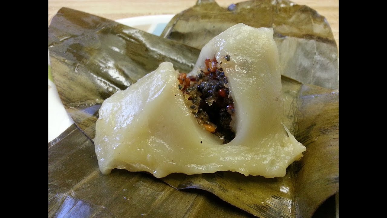How to make Num Koum (Glutinous rice dumplings filled with sweet coconut, basil seeds and peanuts)