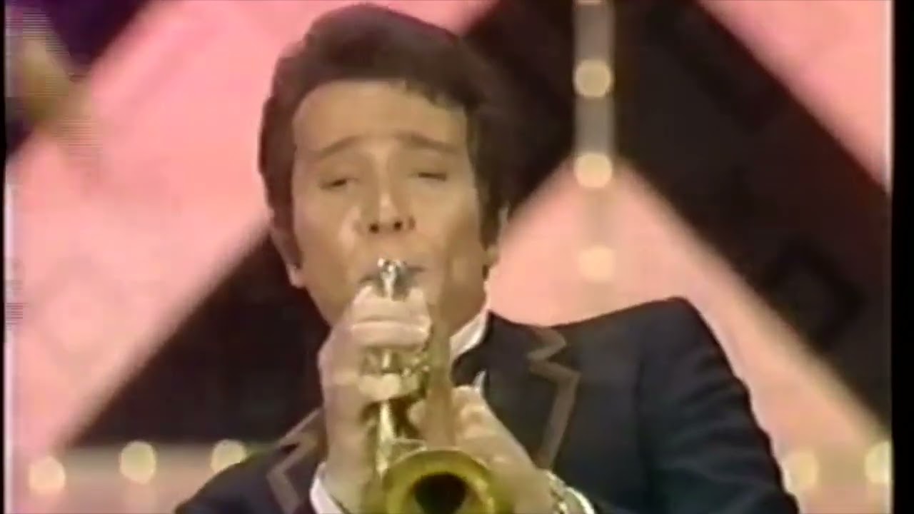 Herb Alpert and the Tijuana Brass perform 