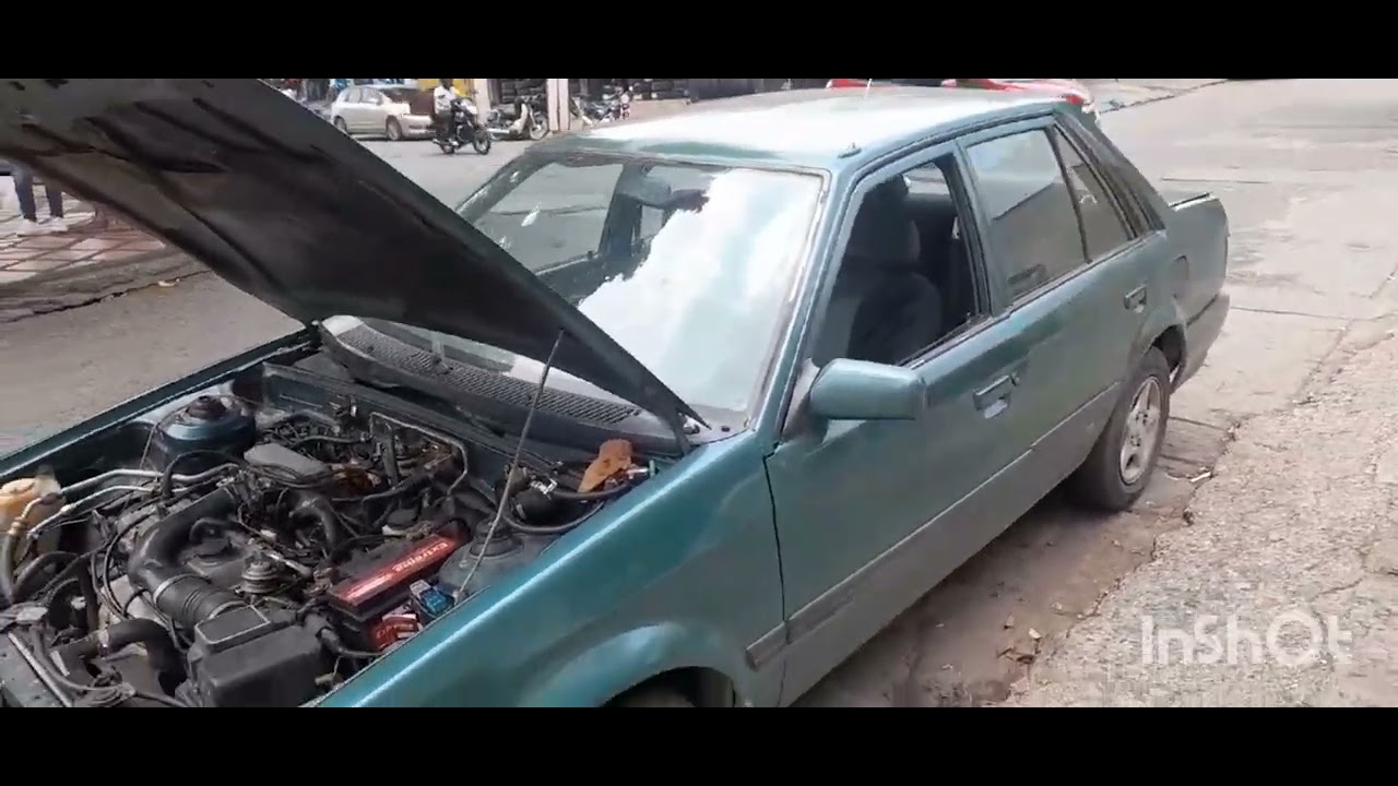 Cambio bomba eléctrica de mazda 323 inyección