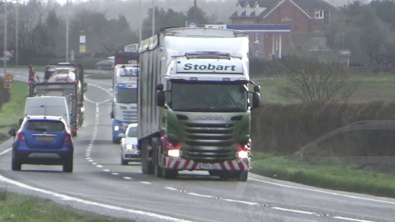 TRUCKS ON THE A41 IN SHROPSHIRE , SLEET SHOWERS