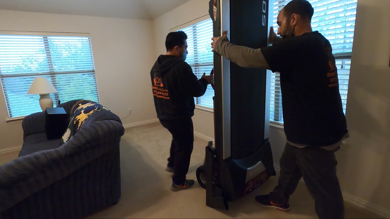 Treadmill Movers in Lewisville TX | Moving a Sole Treadmill to the second floor by Rescue Movers