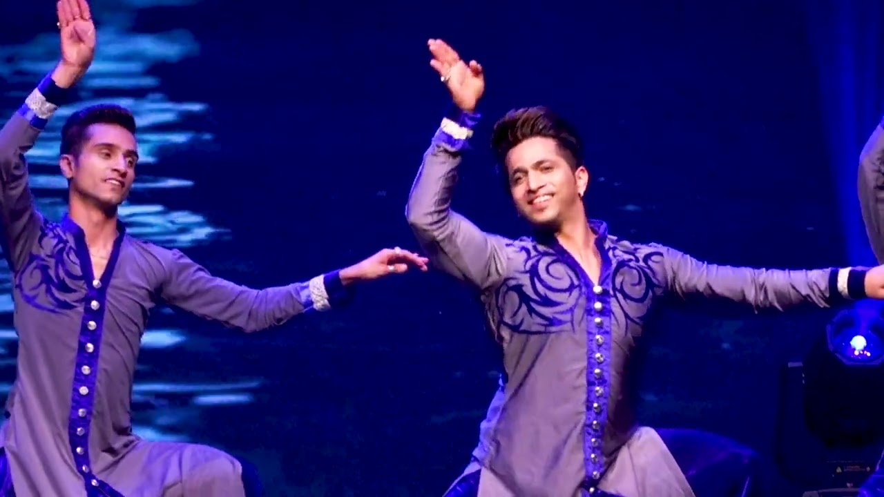 Kumar Sharma and the Kathak Rockers explaining the art form of kathak dance.
