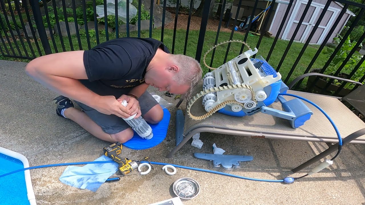 Dolphin M400 Pool vacuum maintenance, 3rd season.  Install new foam roller and center scrubber #pool