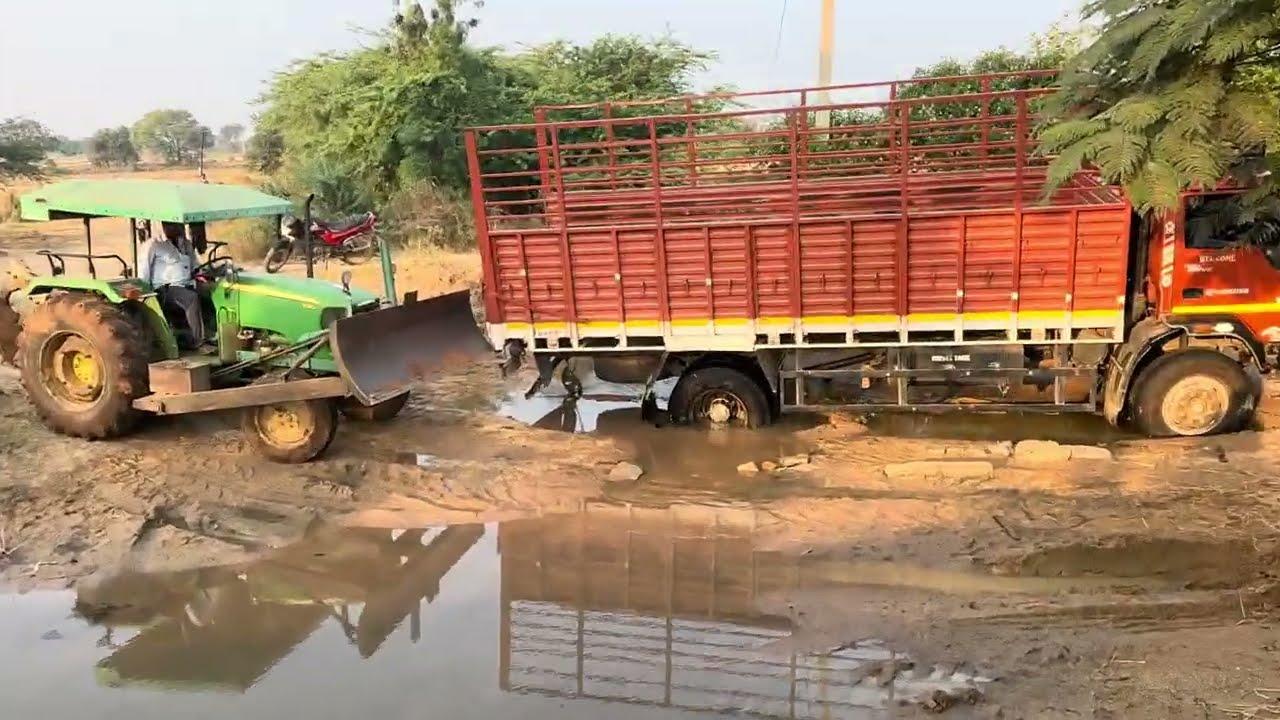 Eicher Dcm stucked in mud rescued by johndeere 5310 