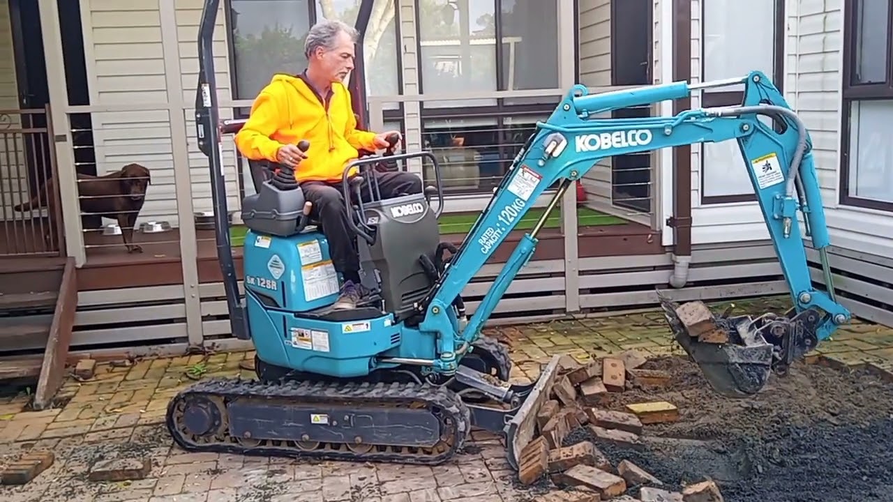 Wacker Neusen 501 and Kobelco SK12SR, Mini Excavation, removing paver bricks. Sydney, Australia.