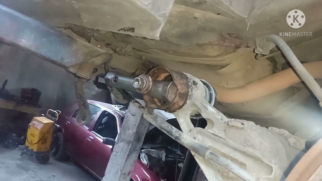 troca da bucha  do eixo traseiro da Zafira , método rápido e prático.
