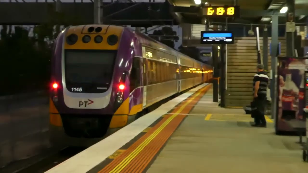 Two V/Line trains picking up at Watergardens