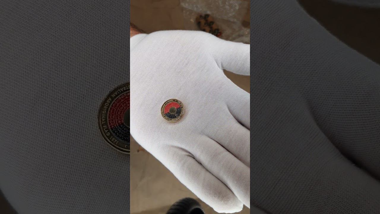 Unwrapping 2021 $2 Aboriginal uncurculated coin roll.