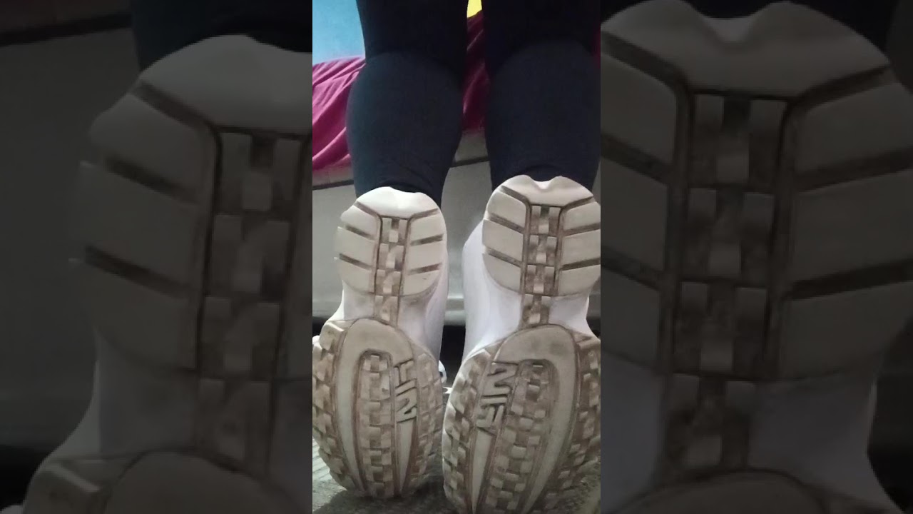 Michelle  showing her Fila Disruptor