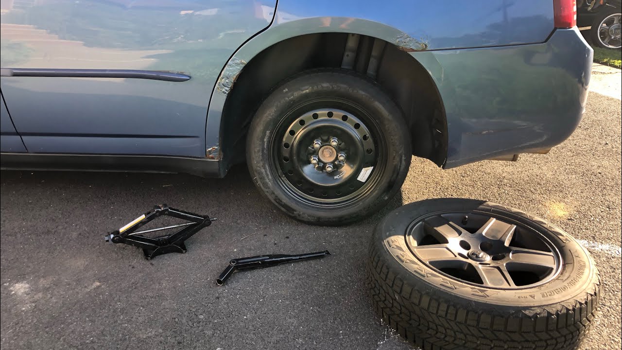 How to change flat tire - wheel removal and donut / spare install - MUST WATCH For Every Car Owner
