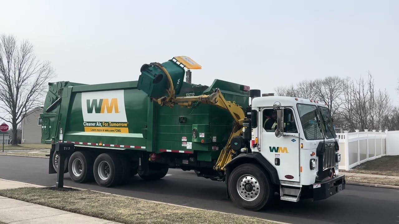 Brand New Waste Management Peterbilt 520 Heil Python side loader garbage truck