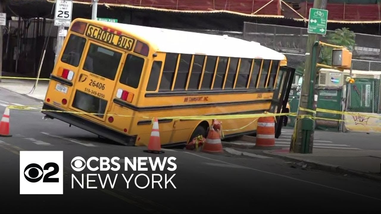 School bus full of kids gets stuck in sinkhole in the Bronx