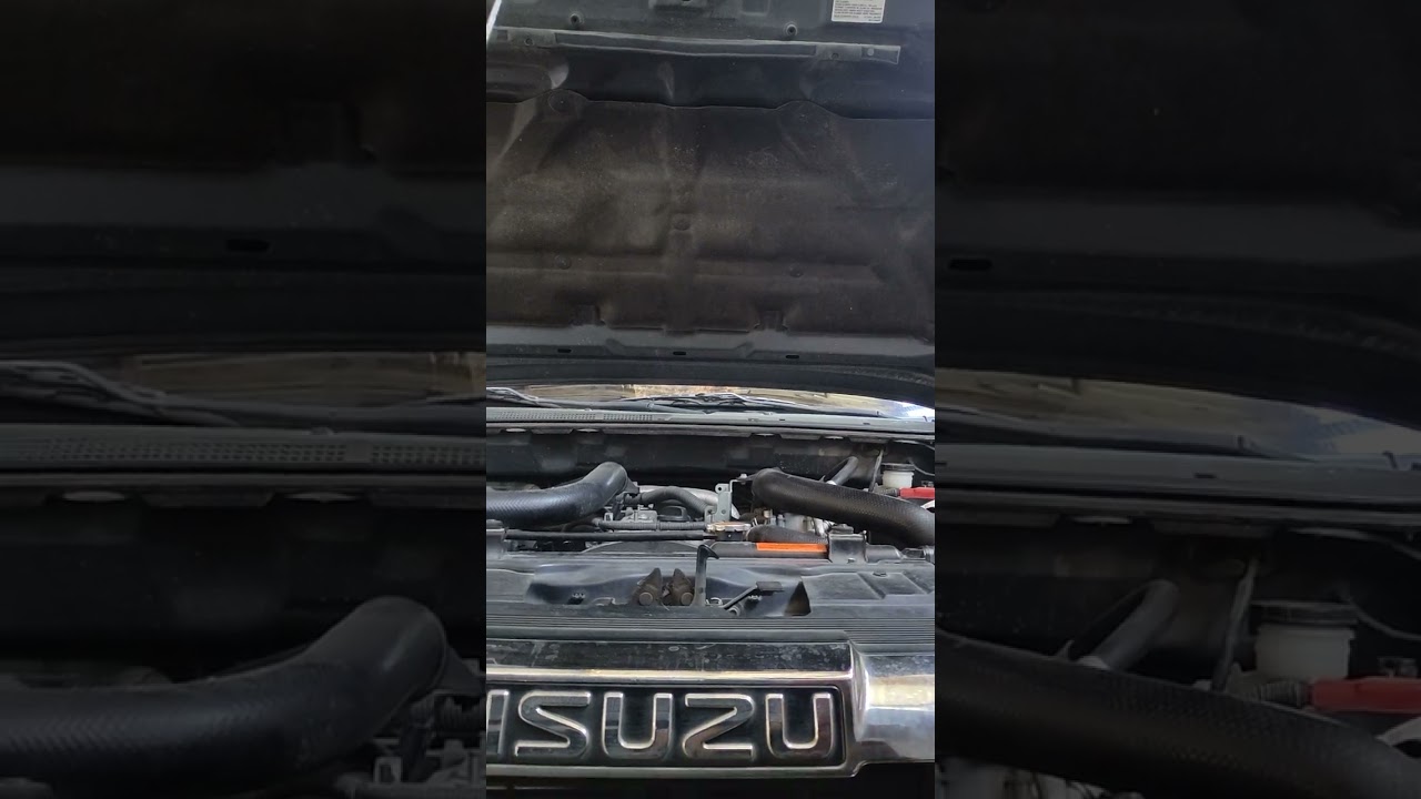 ISUZU DMAX CHANGE FANBELT FOR AIRCON.(1)