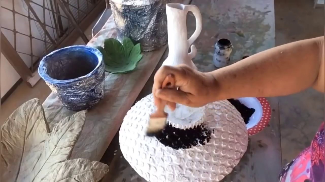 PEÇA DECORATIVA DE CIMENTO AREIA E TECIDO