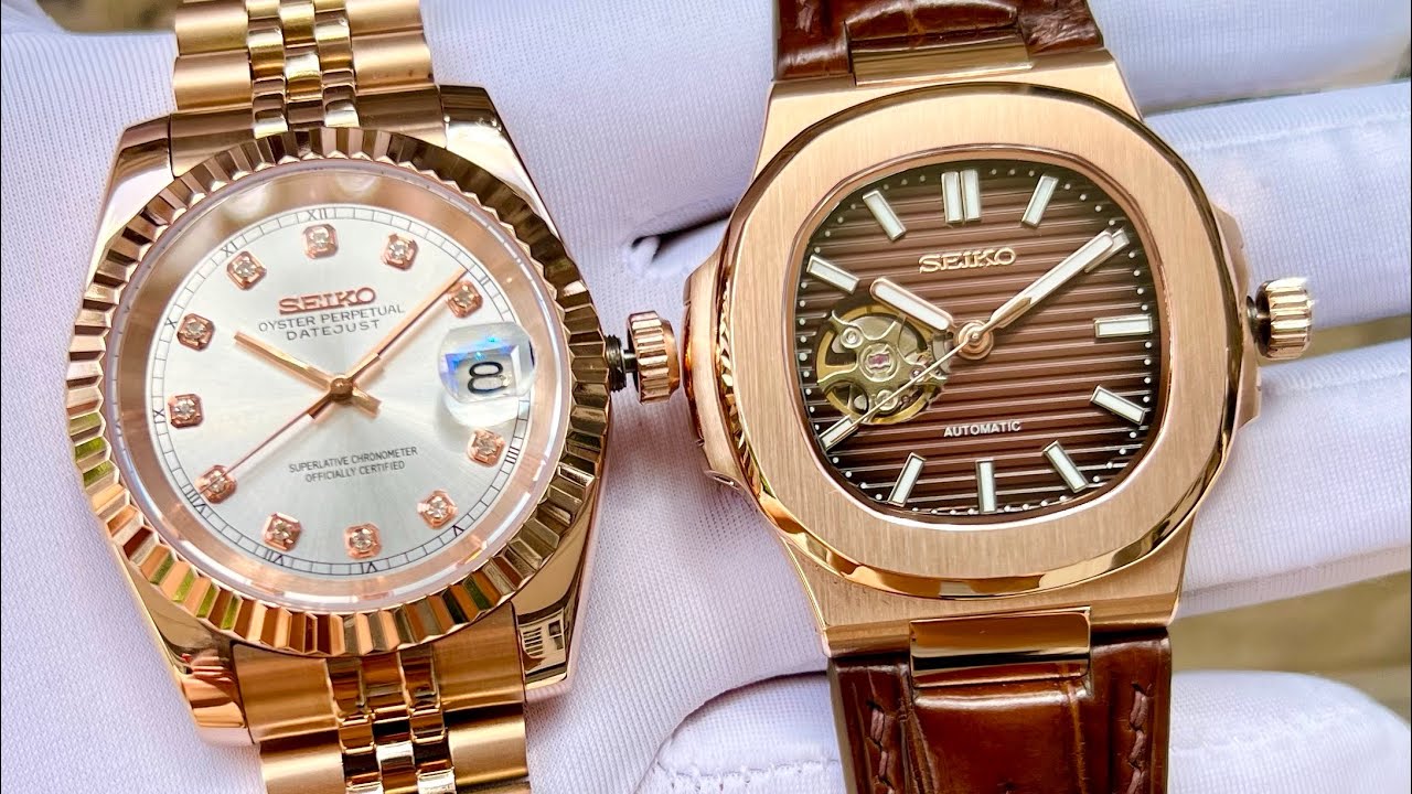 Seiko Mod Date Just và Nautilus Open Heart 0937508840