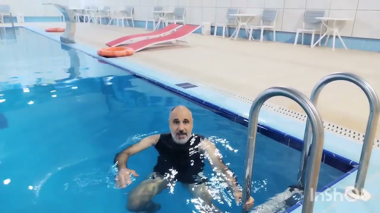 تعليم الوقوف في الماء (الكابتن احمد سامي)
