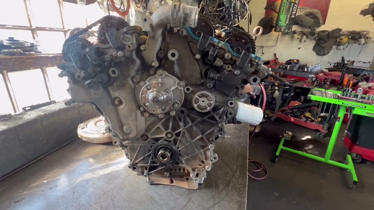 2010 GMC Acadia 3.6L timing chain replacement. P00017,P0008,P0009,P0016,P0018