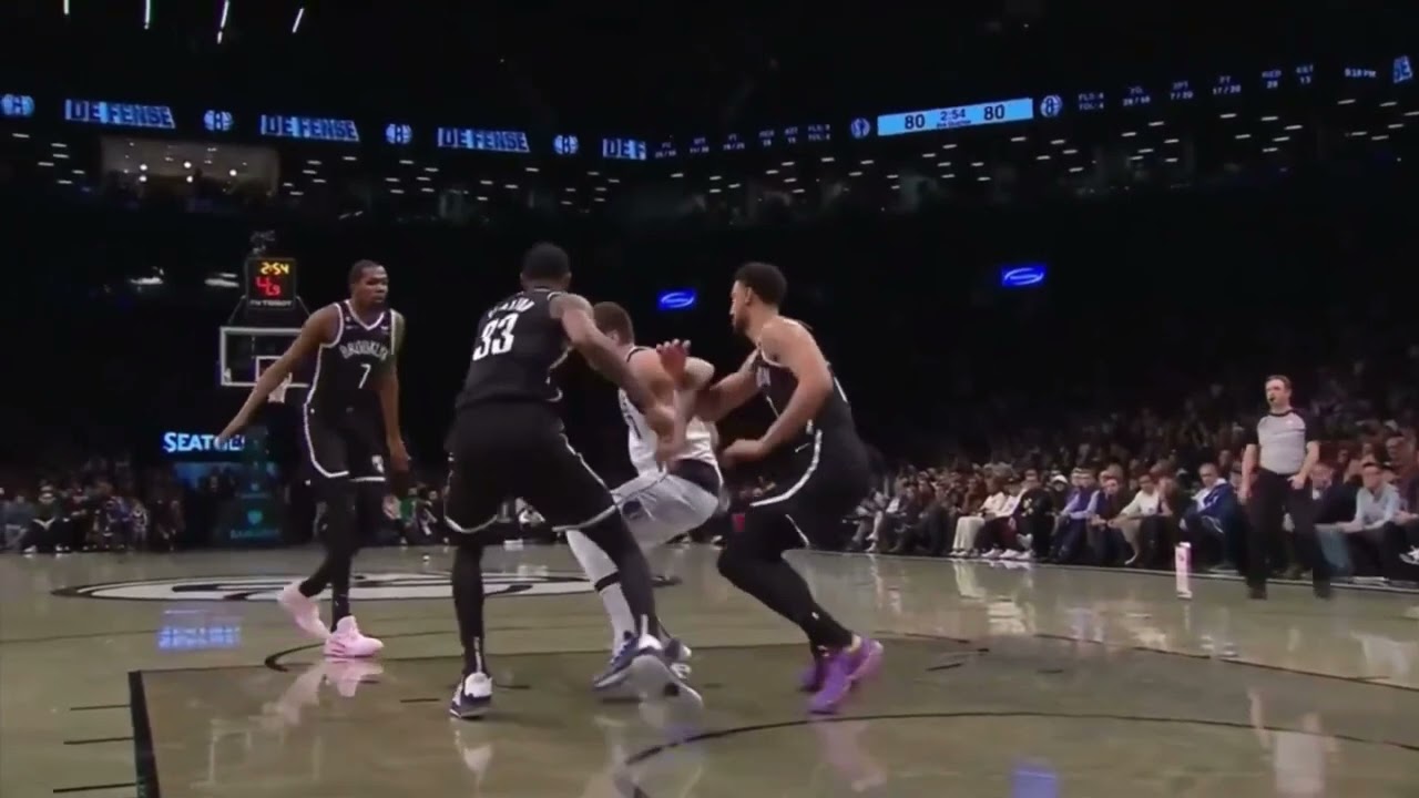 Luka Doncic insane no LOOK Behind the back PASS