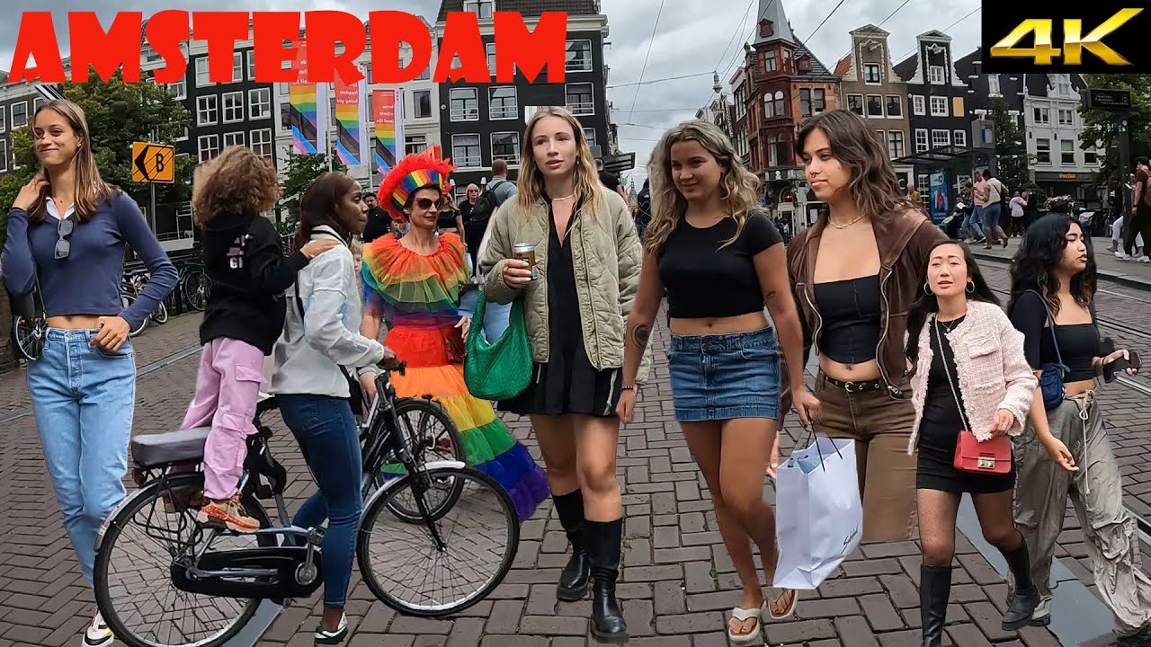 Amsterdam in September. walking tour at Leidsestraat. Sale time and busy Amsterdam