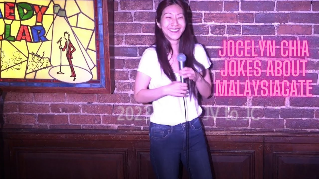 Jocelyn Chia jokes about Malaysiagate with a Malaysian and Singaporeans in the audience
