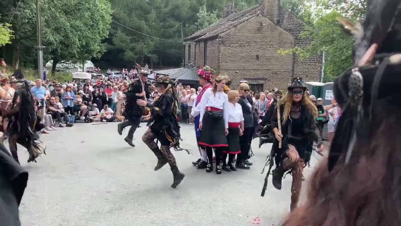 Beltane Border Morris performing Firedance