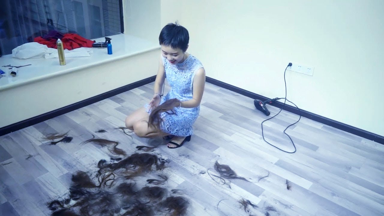 The oriental girl cuts her hair to extremeshort and turns into a spiritual guy 2X1002422