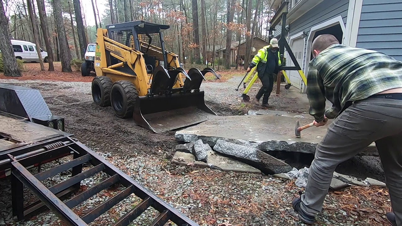 Concrete Slab Removal with Skid Steer and Sledge Hammer