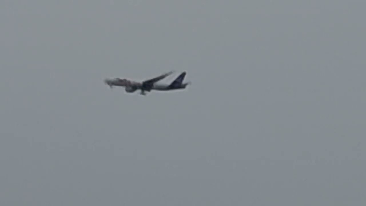 Fedex 777 on shrot final  for 23L 