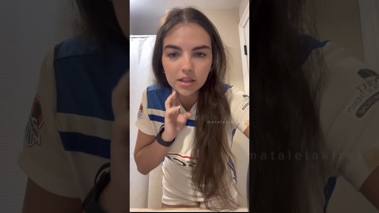 beautiful woman in a football jersey