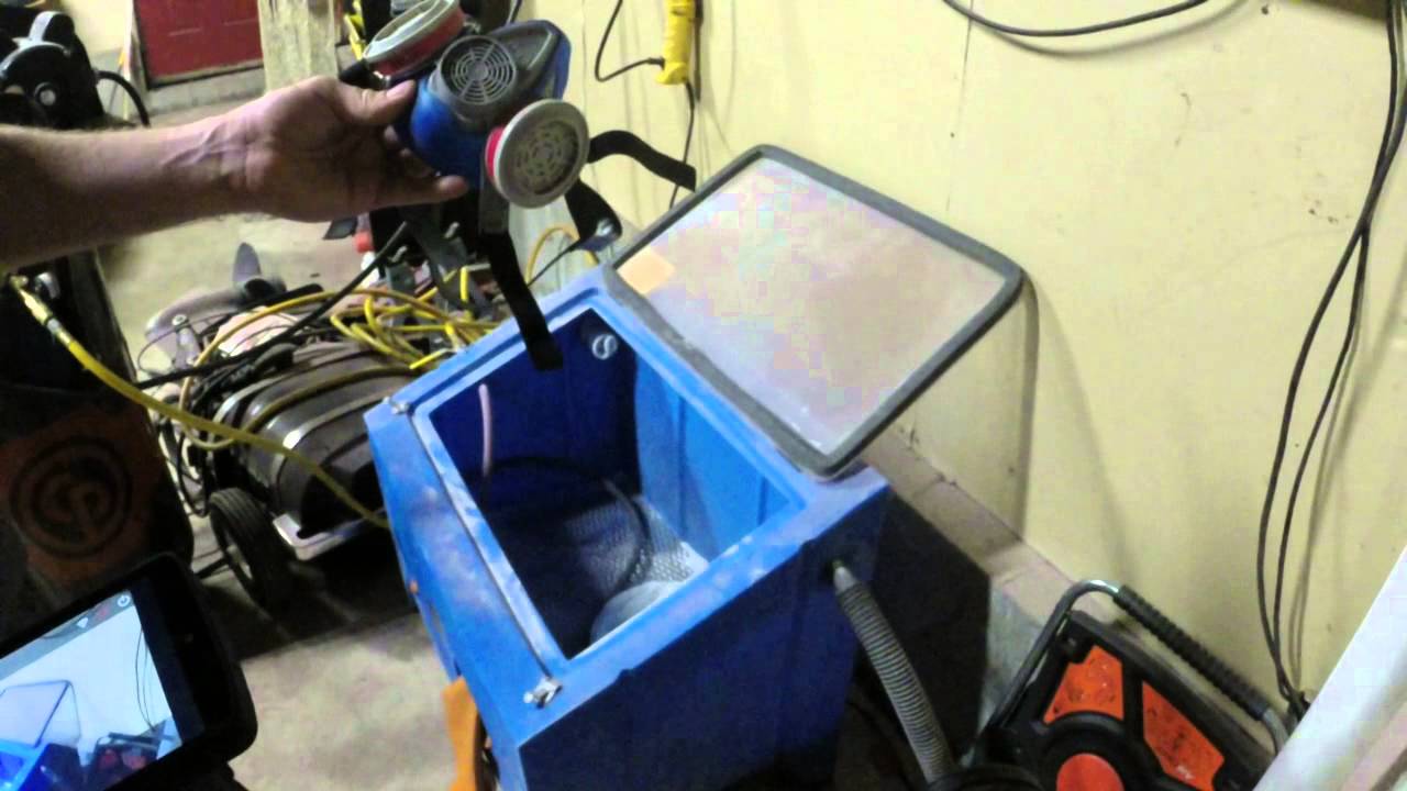 How to etch glass with a sand blasting cabinet.